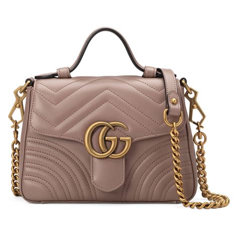 GG Milano mini top handle bag in Green Leather .